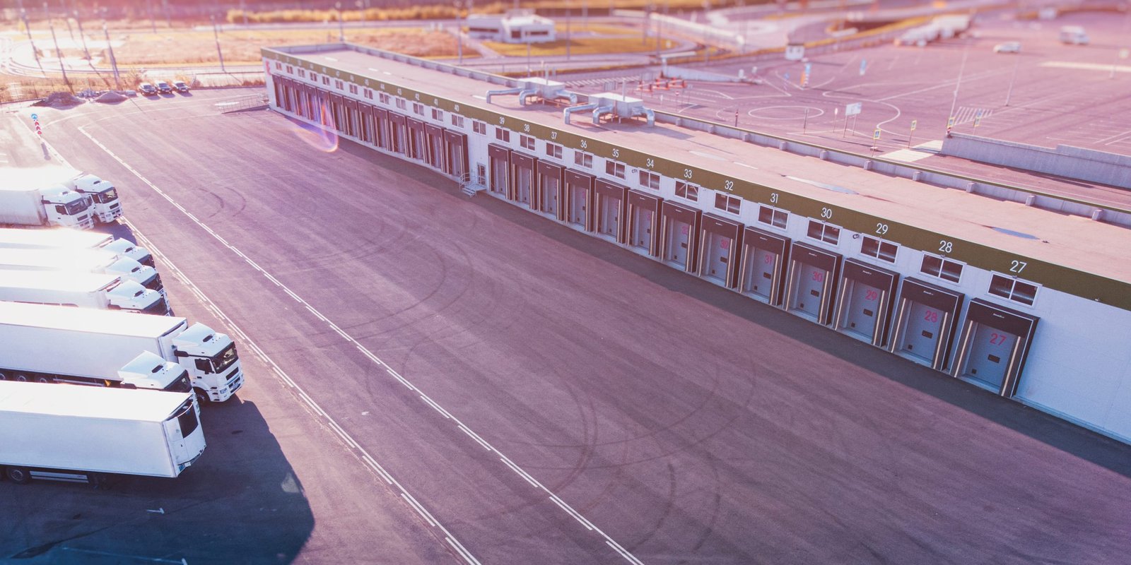 Services vecteezy-aerial-shot-of-an-industrial-loading-dock-warehouse-and-13726276
